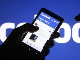 Person browsing Facebook on smartphone.