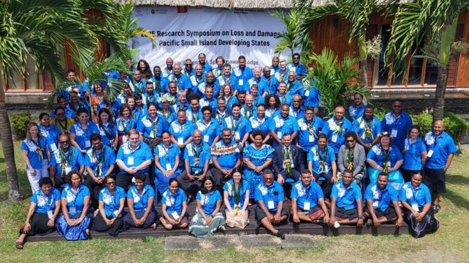 Group photo at Pacific symposium, blue shirts. Group photo at Pacific symposium, blue shirts.