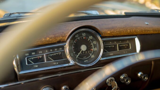 Vintage car dashboard with speedometer and gauges. Vintage car dashboard with speedometer and gauges.