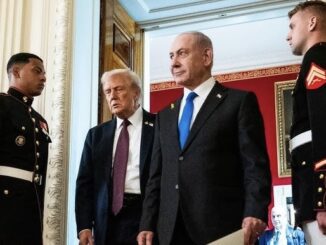 Men in suits and uniforms in hallway.