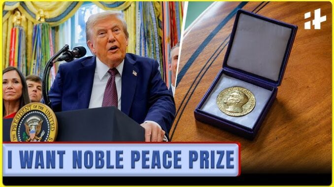 Man speaking beside Nobel Peace Prize medal.