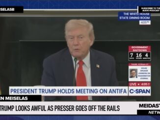Man speaking at press conference on Antifa.