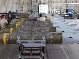Missiles lined up in a maintenance facility.