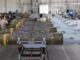 Missiles lined up in a maintenance facility.
