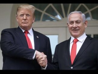 Two men shaking hands, wearing red ties.