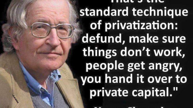Man beside a quote about privatization.