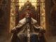 Regal king seated on ornate throne.