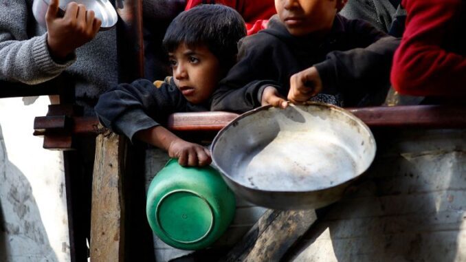 Children holding empty plates and containers. Children holding empty plates and containers.