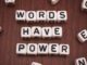 Letter tiles spell "Words Have Power".