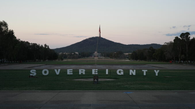Sovereignty sign with mountain and flag background. Sovereignty sign with mountain and flag background.