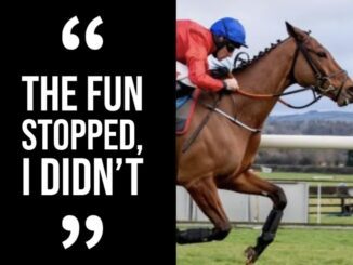 Jockey riding horse with motivational quote.
