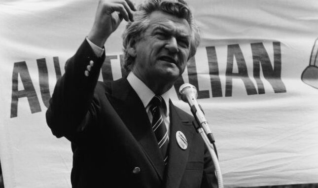 Man giving a speech at a rally.