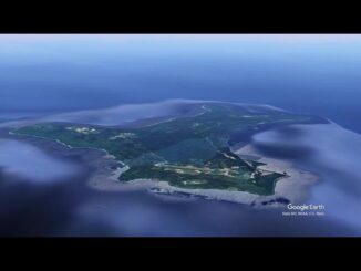 Aerial view of a lush green island.