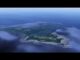 Aerial view of a lush green island.