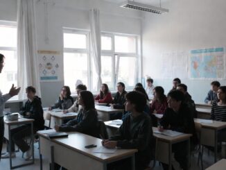 Teacher instructing students in a classroom setting.