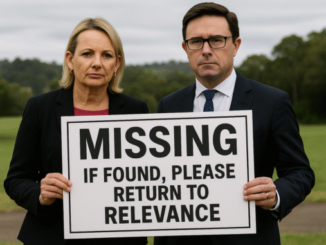 Two people holding a "Missing" sign.