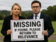 Two people holding a "Missing" sign.