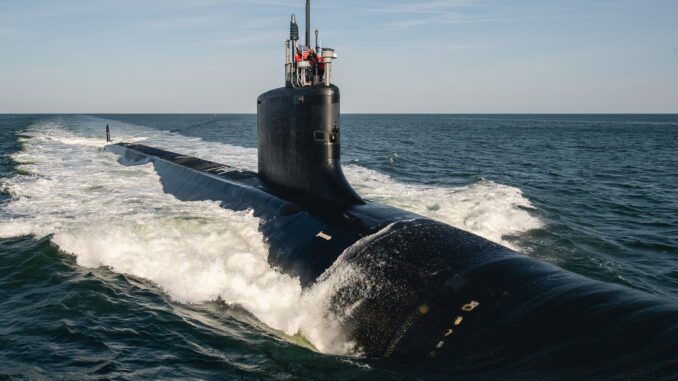 Submarine cruising on the ocean surface. Submarine cruising on the ocean surface.