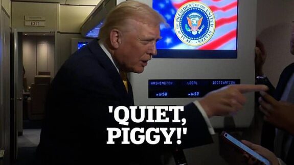 Person pointing, text overlay: "Quiet, Piggy!