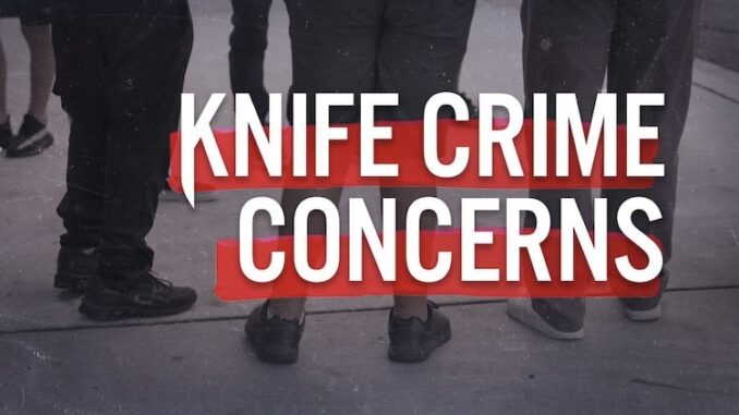 Group standing with "Knife Crime Concerns" text. Group standing with "Knife Crime Concerns" text.