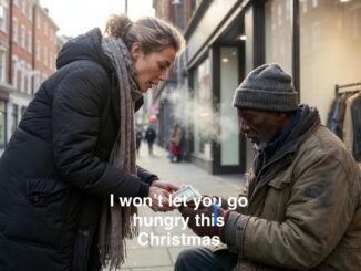 Woman helping man on city street.