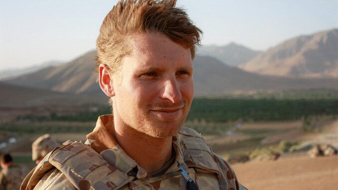 Soldier smiling with mountainous landscape background. Soldier smiling with mountainous landscape background.