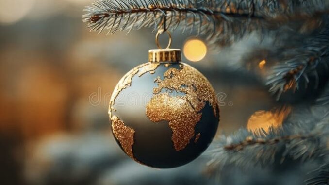 Globe ornament hanging on Christmas tree branch. Globe ornament hanging on Christmas tree branch.