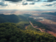 Aerial view of landscape with forests.