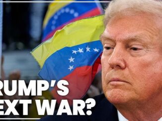 Man with Venezuelan flags in background.