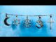 Five religious symbols hanging on chain.