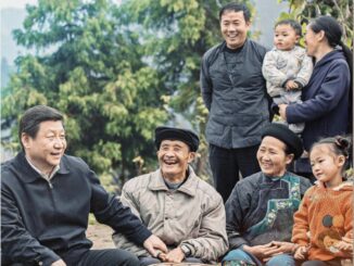Group of people smiling outdoors together.