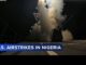Naval destroyer launching missile over deck