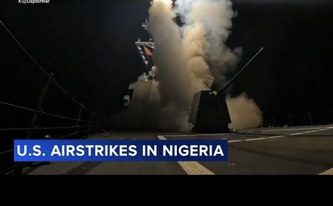 Naval destroyer launching missile over deck Naval destroyer launching missile over deck