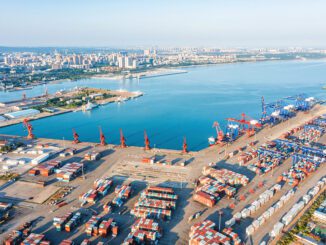 Aerial view of a busy shipping port.