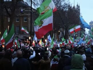Protesters waving flags during a demonstration.
