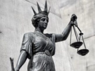 Statue of Lady Justice with scales.