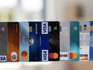 Various credit cards lined up in a row.