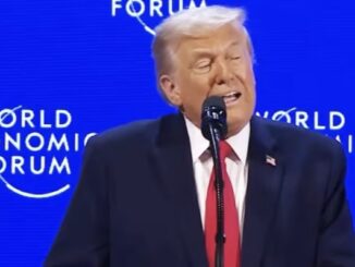 Blond-haired speaker at World Economic Forum podium