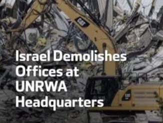 Excavator demolishing UNRWA headquarters building rubble.