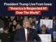 Trump speaking at Iowa rally, crowd listening.