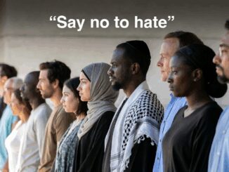 Diverse group standing with "Say no to hate.