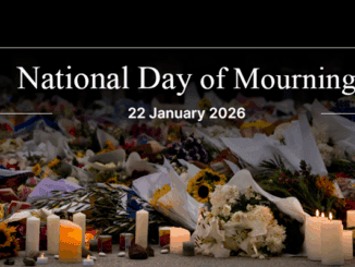 Candles and flowers for National Day of Mourning.