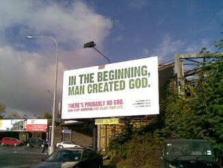 Billboard with atheistic message near road.