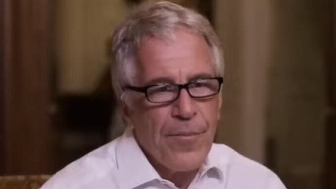 Man wearing glasses and a white shirt.