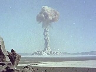 Nuclear explosion with large mushroom cloud.