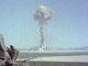 Nuclear explosion with large mushroom cloud.