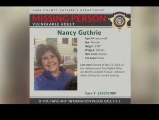 Missing person poster for elderly woman.