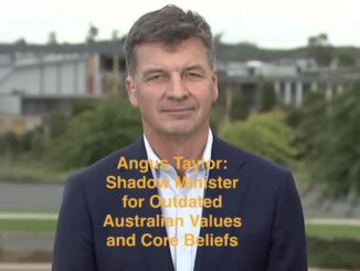 Man in suit with critical text overlay.