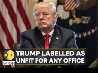 Person sitting with news headline overlayed.