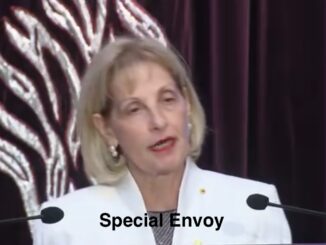 Woman speaking at podium, "Special Envoy" text.